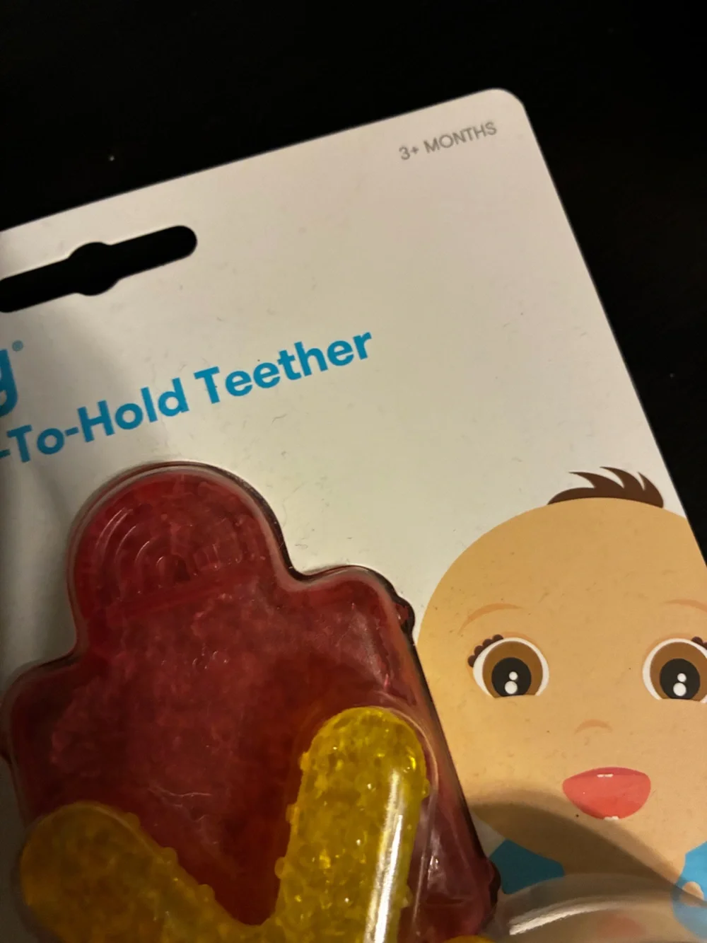 fridababy Not-Too-Cold-To-Hold Teether - White Handle with Red & Yellow Inserts